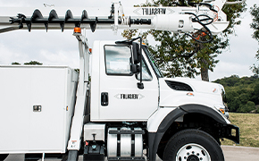 White Digger Derrick truck
